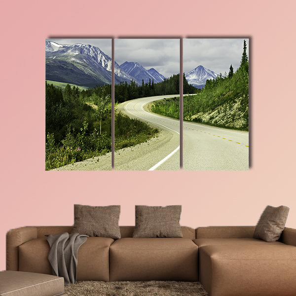 Curved asphalt road in high mountains of Alaska multi panel canvas wall art