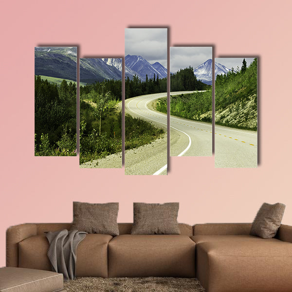 Curved asphalt road in high mountains of Alaska multi panel canvas wall art