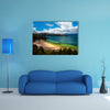 The beautiful deep green and blue colors of Lake Tota Multi Panel Canvas Wall Art