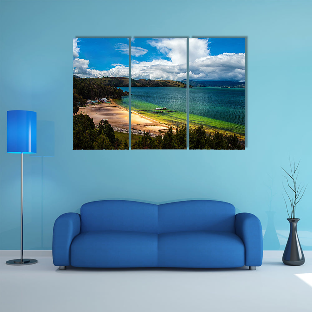 The beautiful deep green and blue colors of Lake Tota Multi Panel Canvas Wall Art
