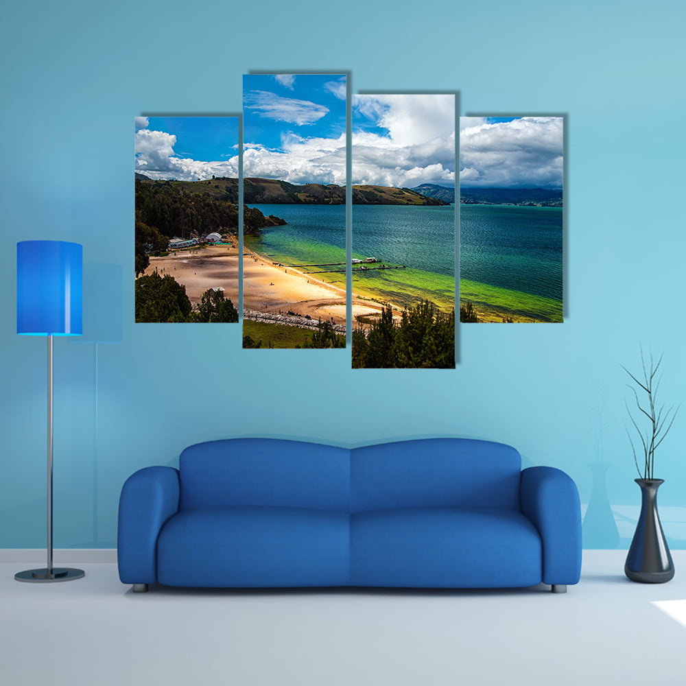 The beautiful deep green and blue colors of Lake Tota Multi Panel Canvas Wall Art