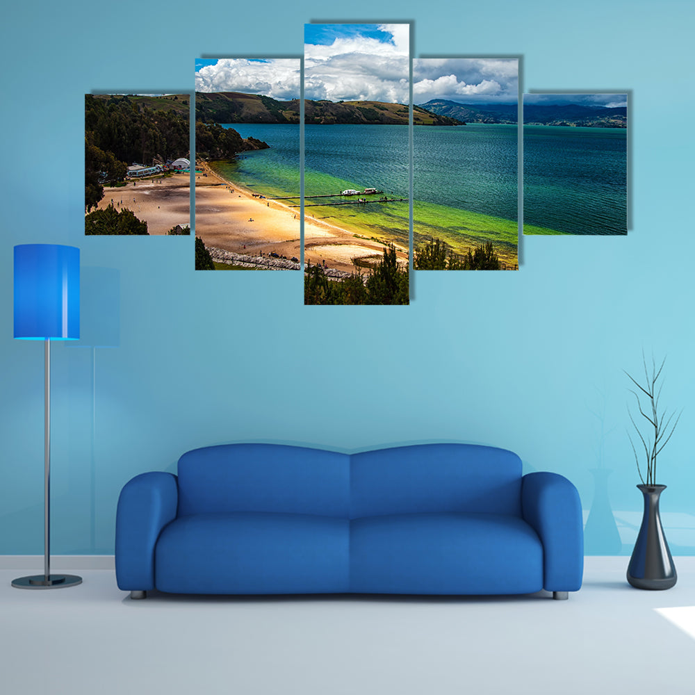 The beautiful deep green and blue colors of Lake Tota Multi Panel Canvas Wall Art