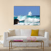 Waves are high and this one curls and rolls over the black rocks of Ahalanui Beach on the Big Island of Hawaii Multi Panel Canvas Wall Art