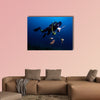 Spear fisherman with spear gun Multi panel canvas wall art