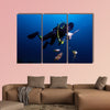 Spear fisherman with spear gun Multi panel canvas wall art