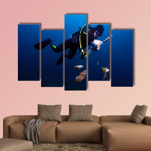 Spear fisherman with spear gun Multi panel canvas wall art