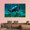 Spear fisherman with spear gun Multi panel canvas wall art