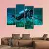 Spear fisherman with spear gun Multi panel canvas wall art