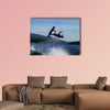 Guy on wakeboard jumping Multi panel canvas wall art