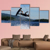 Guy on wakeboard jumping Multi panel canvas wall art