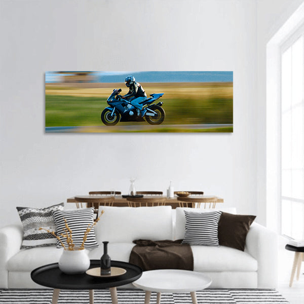 A motorbike speed on the street panoramic canvas wall art