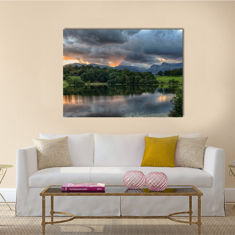 The Sun setting over the Langdale Pikes with Loughrigg Tarn multi panel canvas wall art