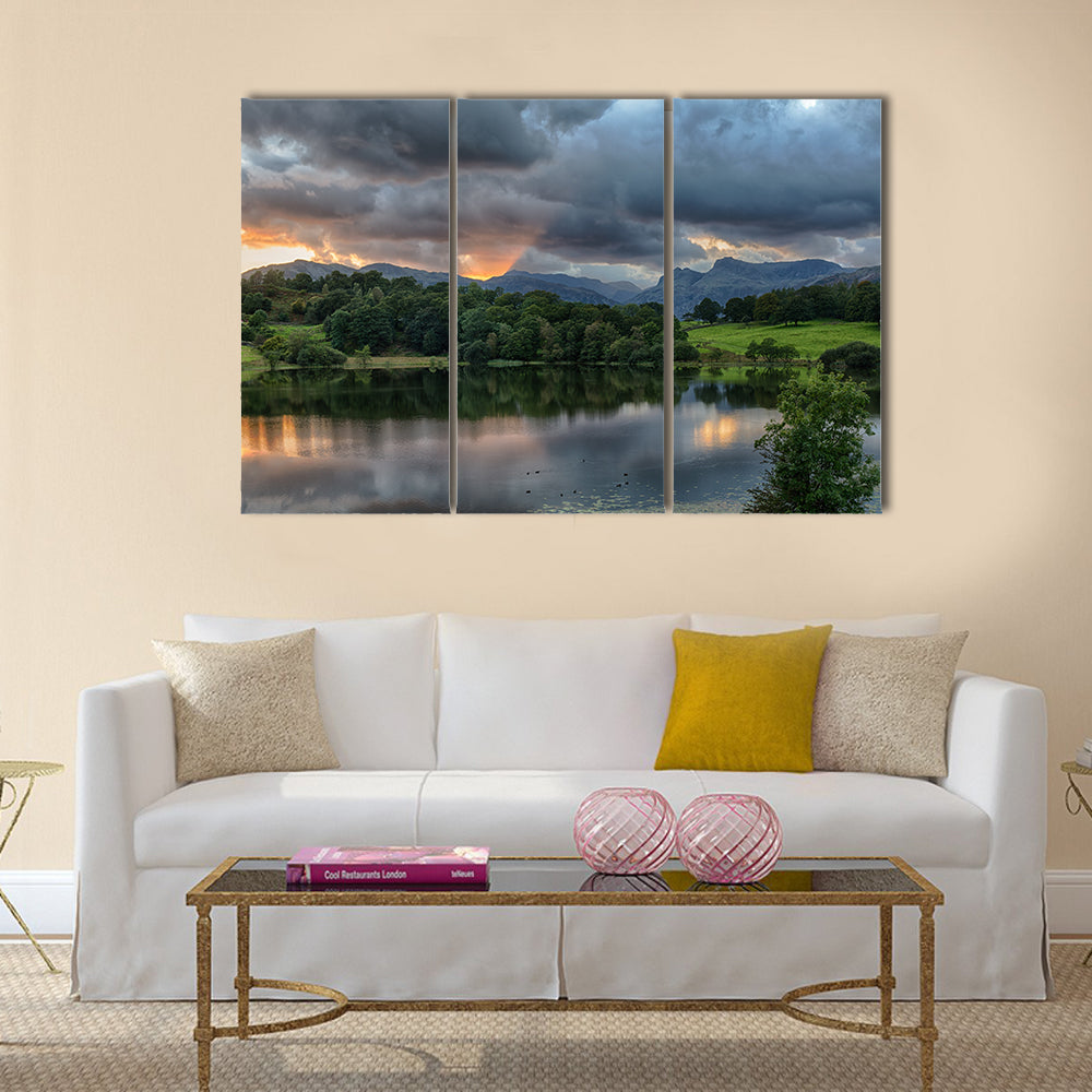 The Sun setting over the Langdale Pikes with Loughrigg Tarn multi panel canvas wall art