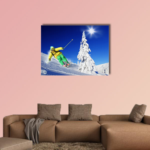 Skier skiing downhill in high mountains Multi panel canvas wall art
