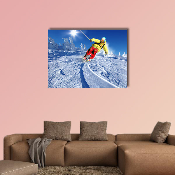 Skier skiing downhill in high mountains Multi panel canvas wall art