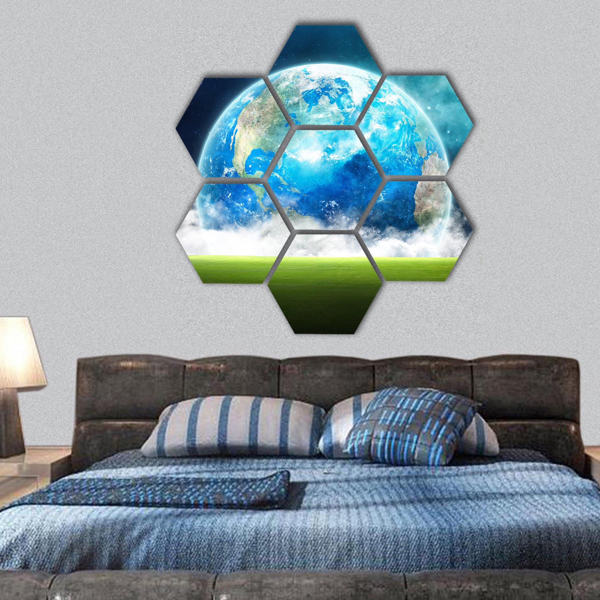 Earth rising in space over a green grassy field hexagonal canvas wall art