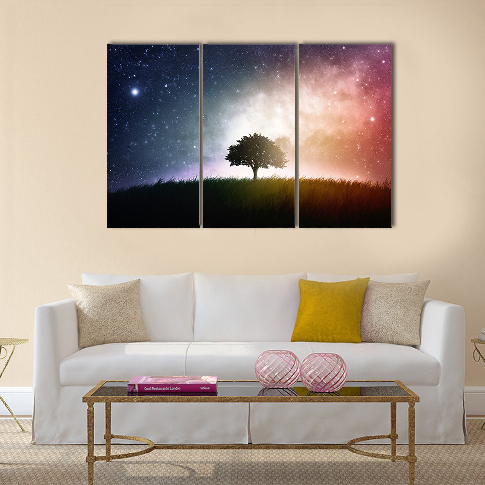A single tree in a field with beautiful space background Multi Panel Canvas Wall Art