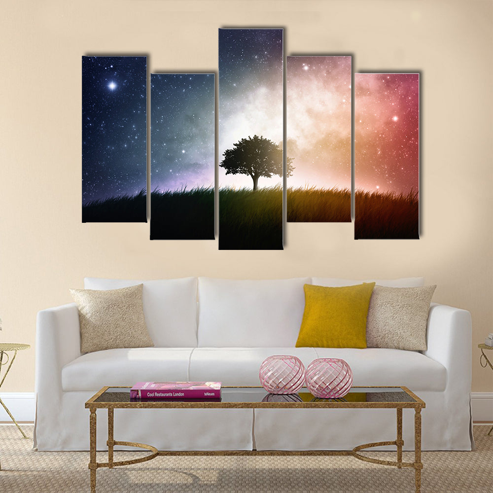 A single tree in a field with beautiful space background Multi Panel Canvas Wall Art