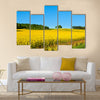 Rapeseed field with forest far away Multi panel canvas wall art