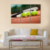 Close up view of tennis racket and balls on the clay tennis court Multi panel canvas wall art