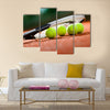 Close up view of tennis racket and balls on the clay tennis court Multi panel canvas wall art