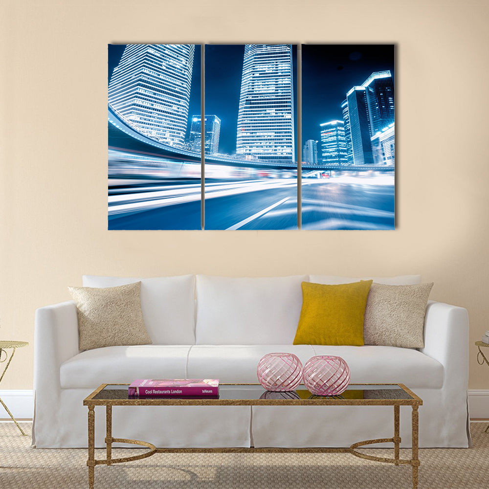 Fast moving cars at night Multi Panel Canvas Wall Art