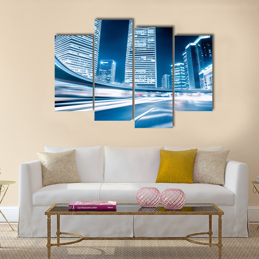 Fast moving cars at night Multi Panel Canvas Wall Art