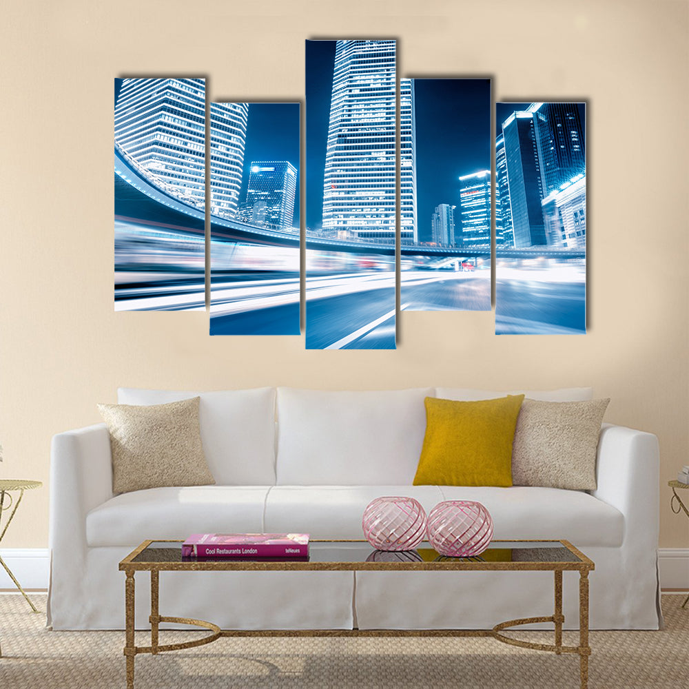 Fast moving cars at night Multi Panel Canvas Wall Art