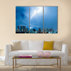 Real lightning bolt strike in a city Multi Panel Canvas Wall Art