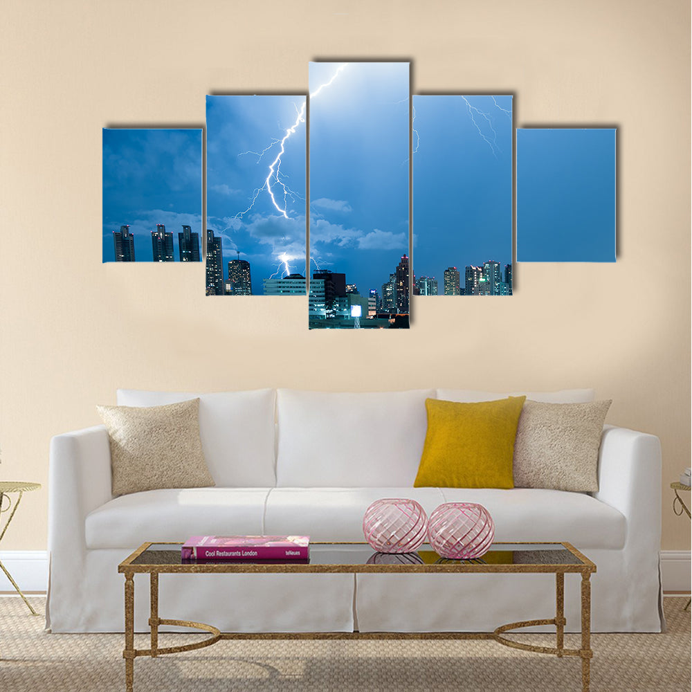 Real lightning bolt strike in a city Multi Panel Canvas Wall Art