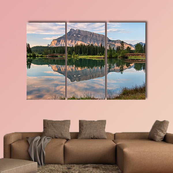 Rundle mountain reflected in pond with two bridges Multi panel canvas wall art
