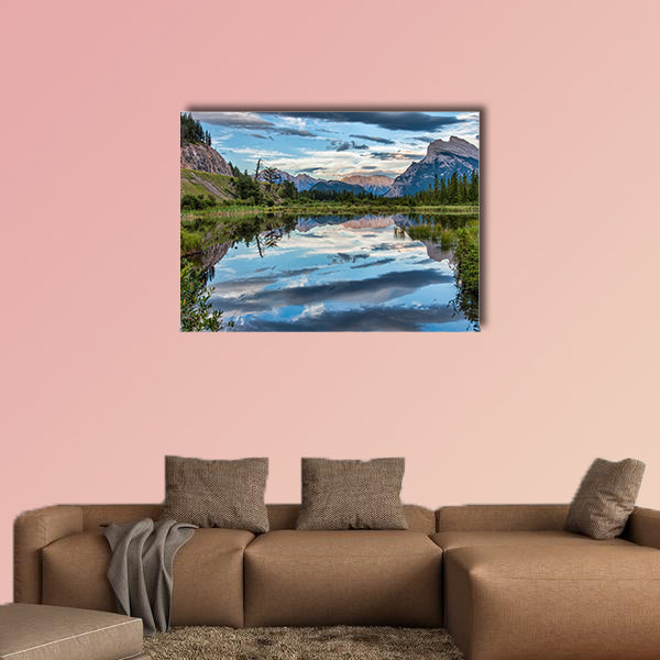 Reflection of dramatic dark clouds in Vermilion Lake outside of the town wall art