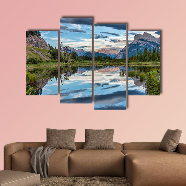 Reflection of dramatic dark clouds in Vermilion Lake outside of the town wall art