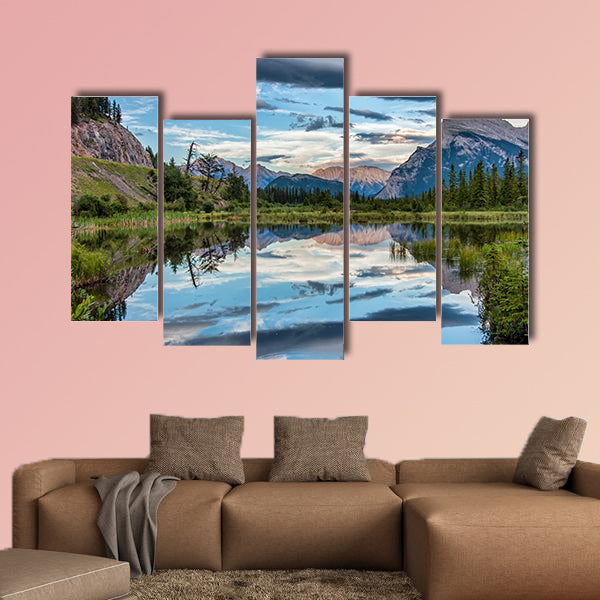Reflection of dramatic dark clouds in Vermilion Lake outside of the town wall art