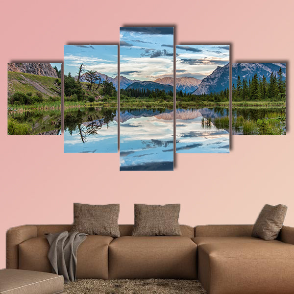 Reflection of dramatic dark clouds in Vermilion Lake outside of the town wall art