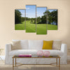 Beautiful golf fairway lined with trees Multi Panel Canvas Wall Art