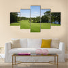 Beautiful golf fairway lined with trees Multi Panel Canvas Wall Art