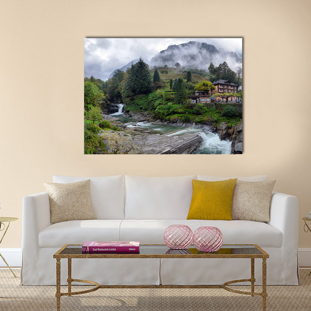 Swiss village in the mountains with mist and waterfall multi panel canvas wall art