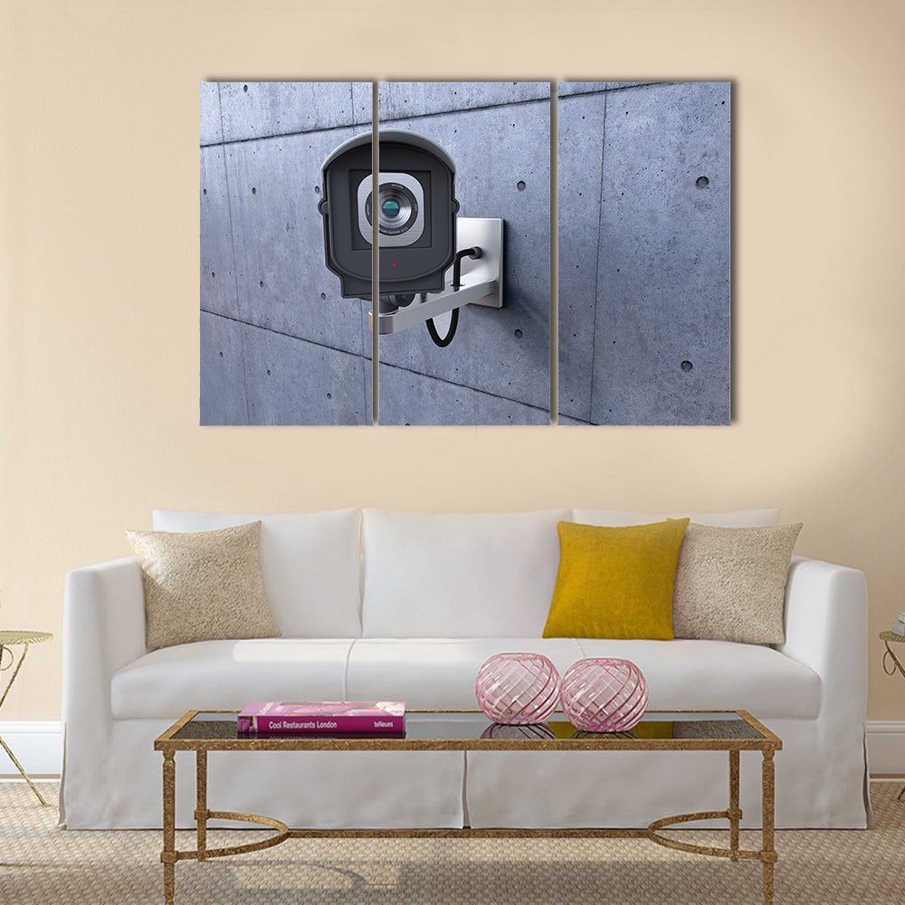 Security camera looking at you on concrete wall Multi panel canvas wall art