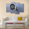 Security camera looking at you on concrete wall Multi panel canvas wall art