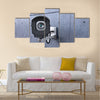 Security camera looking at you on concrete wall Multi panel canvas wall art