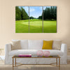 Green golf field with sky Multi Panel Canvas Wall Art