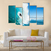 A Surfer On Blue Ocean Wave In The Tube, Multi Panel Canvas Wall Art