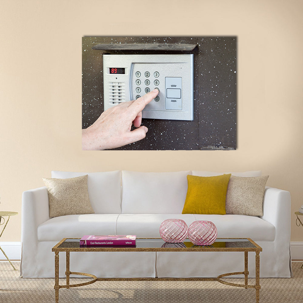 Close-up of uses intercom in steel door Multi panel canvas wall art
