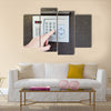 Close-up of uses intercom in steel door Multi panel canvas wall art