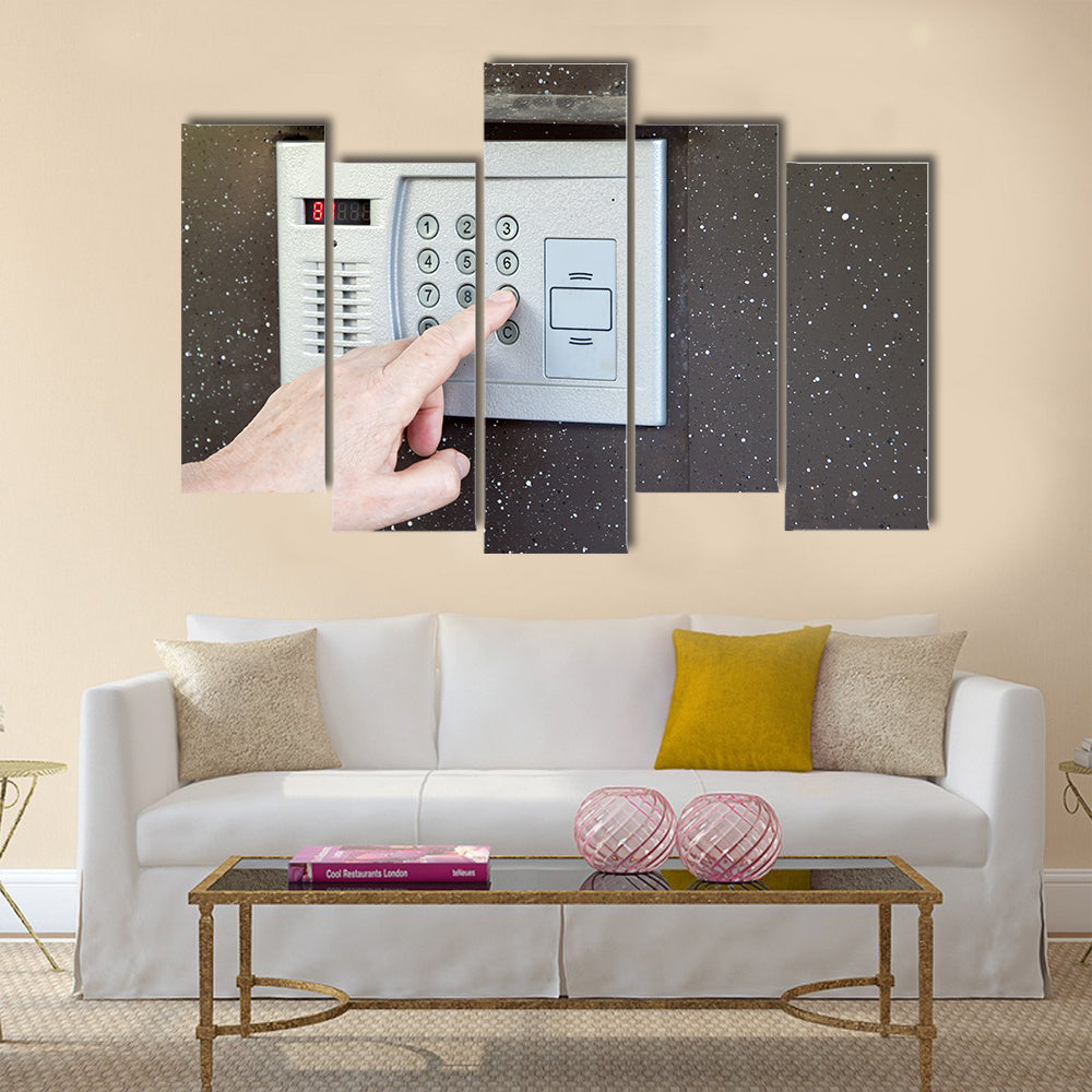 Close-up of uses intercom in steel door Multi panel canvas wall art