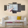 Close-up of uses intercom in steel door Multi panel canvas wall art