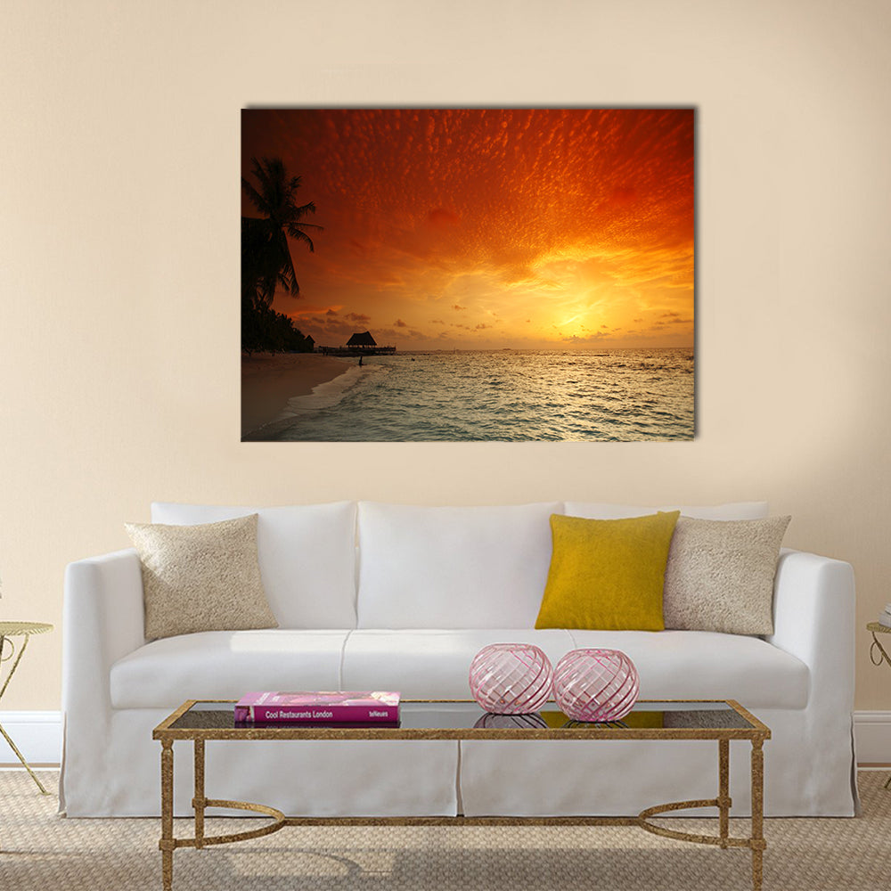 Beautiful view of sea and empty beach with palms on sunset Multi panel canvas wall art