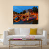 Canals in Amsterdam at night Multi panel canvas wall art