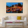 Canals in Amsterdam at night Multi panel canvas wall art